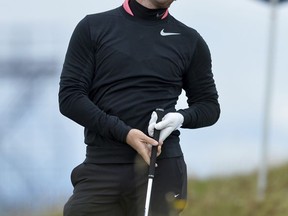 Northern Ireland's Rory McIlroy gestures, during day four of the Dunhill Links Championship at The Old Course at St. Andrews, in Fife, Scotland, Sunday Oct. 8, 2017. (Mark Runnacles/PA via AP)
