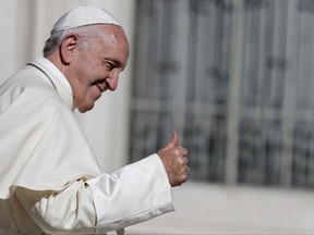 Pope Francis gives his thumb up at the end of his weekly general audience in St. Peter's Square at the Vatican, Wednesday, Oct. 11 2017. (Fabio Frustaci/ANSA via AP)