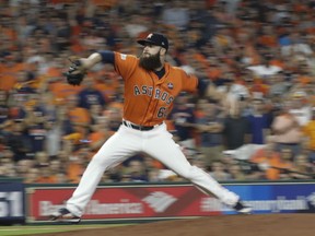 Houston Astros lefthander Dallas Keuchel  fires a pitch during seven innings of shutout ball against the New York Yankees in Game 1 of the ALCS Friday night in Houston. The Astros drew first blood in the series with a 2-1 victory.