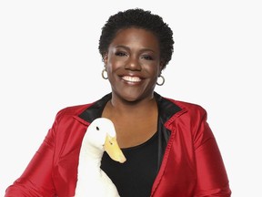 In this Dec. 28, 2015 photo released by Aflac U.S., President of Georgia-based insurance giant Aflac U.S. Teresa White poses for a photo in Georgia. White, the first black president of Georgia-based insurance giant Aflac U.S., is on a quest to help young African-American girls succeed. (Lonnie Major/Aflac U.S., via AP)