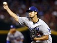 Los Angeles Dodgers starting pitcher Yu Darvish (21) throws against the Arizona Diamondbacks during the first inning of game 3 of baseball's National League Division Series, Monday, Oct. 9, 2017, in Phoenix. (AP Photo/Ross D. Franklin)