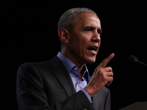 Former U.S. president Barack Obama campaigns for Democratic gubernatorial candidate Ralph Northam at the Greater Richmond Convention Center on October 19, 2017 in Richmond, Virginia.