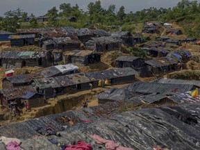 Newly set up tents cover a hillock at a refugee camp for Rohingya Muslims who crossed over from Myanmar into Bangladesh, in Balukhali refugee camp, Bangladesh on Sept. 26, 2017. Wild elephants  entered the camp and trampled tents where several refugees were sleeping.