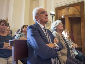 The president of the Italian Anti Mafia Commission Rosy Bindi, right, attends a commemorative mass held in the small chapel of Bidnija, Malta, one week after the murder of journalist Daphne Caruana Galizia, Monday, Oct. 23, 2017. The chapel in the small hamlet of Bidnija is less than 1km away from the journalists house and where she was killed. The service was held by the Archbiscop of Malta, Charles Scicluna. (AP Photo/Rene Rossignaud)