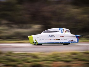 FILE: In this Tuesday, Oct. 10, 2017, file photo, the Punch Powertrain Solar Team car from Belgium competes during the second race day of the 2017 World Solar Challenge in Kulgera, Australia. A Dutch team has won an international solar-powered car race across Australia for a seventh time, with a University of Michigan car likely to take second place in the biennial event. Punch Powertrain came in third. (AP Photo/Geert Vanden Wijngaert, File)