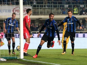 Atalanta's Bryan Cristante, 2nd from right, celebrates after scoring during the Serie A soccer match between Atalanta and Juventus, in Bergamo, Italy, Sunday, Oct. 1, 2017. (Paolo Magni/ANSA via AP)