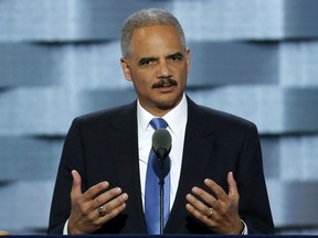 FILE - In this July 26, 2016 file photo, former Attorney General Eric Holder speaks during the second day of the Democratic National Convention in Philadelphia. GLAD, the gay and transgender rights organization, is set to honor Holder with its annual "Spirit of Justice" award on Friday, Oct. 27, 2017, in Boston. (AP Photo/J. Scott Applewhite, File)