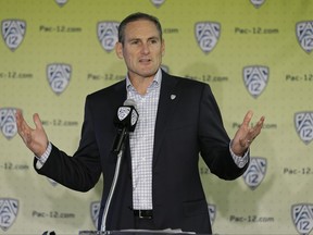 Pac-12 Commissioner Larry Scott speaks during the Pac-12's NCAA college basketball media day, Thursday, Oct. 12, 2017, in San Francisco. (AP Photo/Eric Risberg)