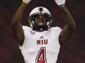 Northern Illinois wide receiver Christian Blake reacts after scoring a touchdown during the first half of an NCAA college football game against San Diego State, Saturday, Sept. 30, 2017, in San Diego. (AP Photo/Gregory Bull)