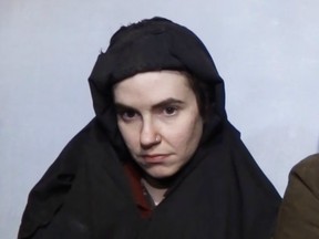 Screen capture from YouTube  of Taliban video showing hostage Caitlan Coleman