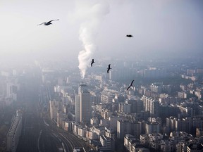 Seagulls flying over the rooftops of Paris in December 2016. The concentration of carbon dioxide in the atmosphere reached a record level in 2016, according to the World Meteorological Organization.