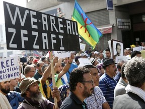 People take part in a demonstration demanding the liberation of activists, prompted by the death of a fish vendor, in Casablanca, Morocco, Sunday, Oct. 8, 2017.  Hundreds of people from around Morocco protested in the nation's economic capital, Casablanca, to demand freedom for jailed activists. (AP Photo/Abdeljalil Bounhar)