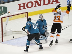 Philadelphia Flyers right wing Wayne Simmonds (17) celebrates after scoring a goal past San Jose Sharks goalie Martin Jones (31) during the third period of an NHL hockey game, Wednesday, Oct. 4, 2017, in San Jose, Calif. Philadelphia won 5-3. (AP Photo/Tony Avelar)