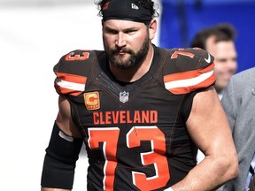 This Sunday, Oct. 22, 2017, photo shows Cleveland Browns tackle Joe Thomas leaving the field after getting hurt in the second half of an NFL football game against the Tennessee Titans, in Cleveland. The Browns are awaiting tests on Pro Bowl tackle Joe Thomas, whose season may be over because of a triceps injury. Thomas was hurt during the third quarter of Sunday's overtime loss to Tennessee, ending his streak of consecutive snaps at 10,363. He had been on the field for every offensive play of his career since 2007 before an injury that left teammates, fans and Titans players shaken. (AP Photo/David Richard)