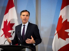 Federal Finance Minister Bill Morneau answers questions following a meeting with private sector economists in Toronto on Thursday, Oct. 5, 2017. THE CANADIAN PRESS/Chris Donovan