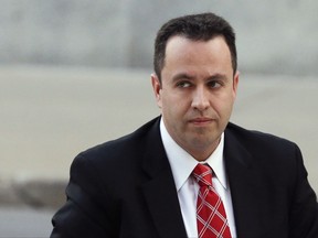 FILE - In this Nov. 19, 2015, file photo, former Subway pitchman Jared Fogle arrives at the federal courthouse in Indianapolis. An Indiana judge has thrown out a lawsuit filed by former Subway pitchman Jared Fogle's ex-wife, which alleged that the fast-food chain continued promoting Fogle as its spokesman even though it knew of his sexual interest in children. (AP Photo/Michael Conroy, File)