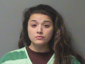 This photo provided by the Polk County Jail in Des Moines, Iowa, shows Destinee Miller, of Des Moines, who was jailed Monday, Oct. 9, 2017, after officers found her three young children alone outside their home, including one covered in feces and another with a full diaper. Miller remains in jail on child endangerment charges. (Polk County Jail via AP)