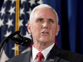 FILE - In this April 17, 2017, file photo, Vice President Mike Pence speaks at the Department of Veterans Affairs in Washington. The state of Indiana is holding back an indeterminate number of Vice President Pence's emails from his time as governor. Pence used private AOL.com accounts to conduct state business when he led the state. His successor, Gov. Eric Holcomb, has released more than 1,300 pages of those emails. But most contain little more than staffers sharing news releases or news articles. (AP Photo/Andrew Harnik, File)