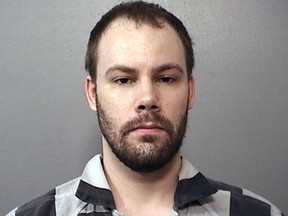 FILE - This photo provided by the Macon County Sheriff's Office in Decatur, Ill., shows Brendt Christensen, the suspect in the kidnapping of visiting University of Illinois Chinese scholar Yingying Zhang. He was previously charged with abducting Zhang but now, Christensen is to appear before a federal court judge Wednesday, Oct. 11, 2017 in Urbana, Ill., on additional charges handed down by a grand jury. (Macon County Sheriff's Office via AP File)