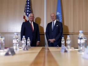 Secretary of State Rex Tillerson, left,  stands with U.N. Special Envoy for Syria Staffan de Mistura before their meeting at the U.S. Mission to the U.N., Thursday, Oct. 26, 2017, in Geneva, Switzerland. (AP Photo/Alex Brandon, Pool)