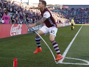 Colorado Rapids midfielder Joshua Gatt taunts visiting fans after scoring a goal against Real Salt Lake early in the first half of an MLS soccer match, Sunday, Oct. 15, 2017, in Commerce City, Colo. (AP Photo/David Zalubowski)