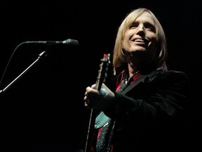 In this June 16, 2006 file photo, Tom Petty performs at the Bonnaroo Music & Arts Festival in Manchester, Tennessee. Petty has died at age 66. Spokeswoman Carla Sacks says Petty died Monday night, Oct. 2, 2017, at UCLA Medical Center in Los Angeles after he suffered cardiac arrest. THE CANADIAN PRESS/AP-Mark Humphrey