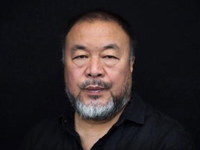 Ai Weiwei poses for a photograph in Toronto on Thursday, September 28, 2017. Chinese dissident and activist Weiwei travelled the globe to visit some of the world's most desperate refugee camps for his documentary, "Human Flow," a bracing look at a migration crisis that has displaced more than 65 million. THE CANADIAN PRESS/Nathan Denette
