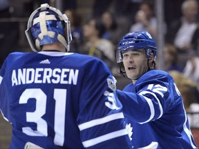 Toronto Maple Leafs centre Patrick Marleau (12) and goalie Frederik Andersen (31) celebrate their win over the Los Angeles Kings following the end of regulation time of NHL hockey action in Toronto on Monday, October 23, 2017.  THE CANADIAN PRESS/Nathan Denette