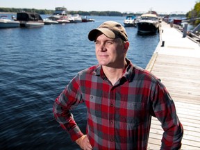 Tommi Linnansaari, a research associate with the Canadian Rivers Institute at the University of New Brunswick and the new UNB CAST Atlantic Salmon Research Chair, poses by the Saint John River in Fredericton in a September 13, 2017, handout photo. He will be coordinating new, innovative research projects aimed at reviving wild Atlantic salmon. THE CANADIAN PRESS/HO-University of New Brunswick, Rob Blanchard, *MANDATORY CREDIT*