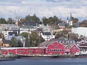 The waterfront in Lunenburg, N.S. is shown on Sunday, October 18, 2015. A simmering feud over sewage sludge that flows into a world-renowned harbour in Nova Scotia took a strange turn after a local fisherman said he was accused of smearing the foul material on the town's mayor. THE CANADIAN PRESS/Andrew Vaughan