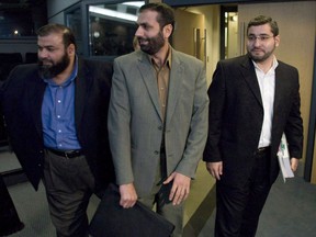 Abdullah Almalki, right to left, Muayyed Nureddin and Ahmad El-Maati arrive at a news conference in Ottawa Tuesday Oct.21, 2008. Three Canadians who were tortured in Syria have received a total of $31 million in federal compensation. THE CANADIAN PRESS/Adrian Wyld