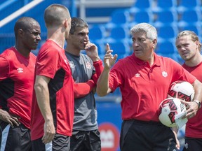 Canada's head coach Octavio Zambrano leads a practice in Montreal on June 12, 2017. Octavio Zambrano looks across Canada and wonders about the talent that has fallen through the cracks. Zambrano, head coach of the Canadian men's national team program, says it's his mission to find it. THE CANADIAN PRESS/Paul Chiasson