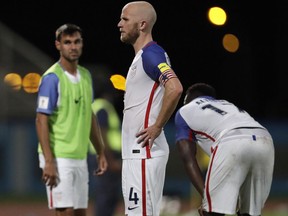 United States' Michael Bradley reacts after losing 2-1 against Trinidad and Tobago during a 2018 World Cup qualifying soccer match  in Couva, Trinidad, Tuesday, Oct. 10, 2017. Bradley says the disappointment of the U.S. failure to qualify for the World Cup won't go away any time soon. THE CANADIAN PRESS/AP/Rebecca Blackwell
