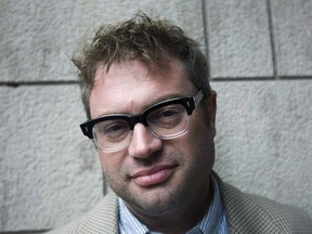 Singer Steven Page poses for a photograph in Toronto on Thursday, October. 14, 2010. Canadian musicians are sharing tearful tributes to Gord Downie. Former Barenaked Ladies singer Page says he knew the late Tragically Hip frontman for many years and praises him for being "totally fearless." THE CANADIAN PRESS/Nathan Denette