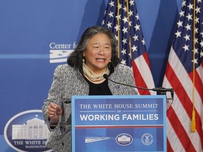 Tina Tchen, chief of staff to first lady Michelle Obama, speaks at The White House Summit on Working Families at a hotel in Washington, Monday, June 23, 2014. THE CANADIAN PRESS/AP/Charles Dharapak