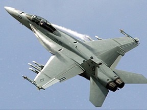 A Boeing F-18 Super Hornet performs during its demonstration flight, on the first day of the 47th Paris Air Show in Le Bourget, north of Paris, Monday June 18, 2007. THE CANADIAN PRESS/AP Photo/Remy de la Mauviniere