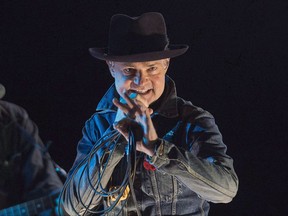 Gord Downie performs his solo project "Secret Path" at the Rebecca Cohn Auditorium in Halifax on Tuesday, Nov. 29, 2016. Tragically Hip fans mourning the death of Gord Downie will have a chance to see a new documentary about the band's final tour and a broadcast of a "Secret Path" concert in the coming days. THE CANADIAN PRESS/Andrew Vaughan