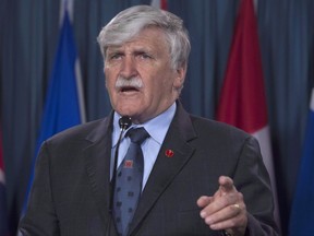 Romeo Dallaire speaks at a news conference on Parliament Hill in Ottawa, Tuesday, May 31, 2016. Canada has been quietly championing an initiative aimed at preventing the recruitment and use of child soldiers, which is expected to be unveiled at a major peacekeeping summit in Vancouver next month. THE CANADIAN PRESS/Adrian Wyld