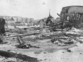 A man looks at damage created by the Halifax Explosion in this image provided by the Marine History Collection of the Nova Scotia Museum. THE CANADIAN PRESS/HO-Marine History Collection, Nova Scotia Museum, *MANDATORY CREDIT*