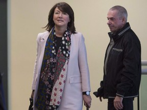 Former Quebec deputy premier Nathalie Normandeau walks to a courtroom for her civil case against her former employer Cogeco, in Quebec City on June 9, 2016. Normandeau, 49, is charged with conspiracy, corruption, breach of trust and fraud in a scheme in which political financing and gifts were allegedly exchanged for lucrative government contracts between 2000 and 2012. THE CANADIAN PRESS/Jacques Boissinot