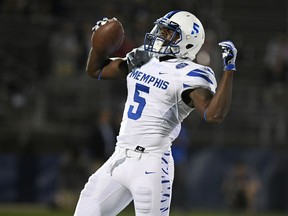 Memphis tight end Sean Dykes celebrates after scoring a touchdown during the first half of an NCAA college football game against Connecticut, Friday, Oct. 6, 2017, in East Hartford, Conn. (AP Photo/Jessica Hill)