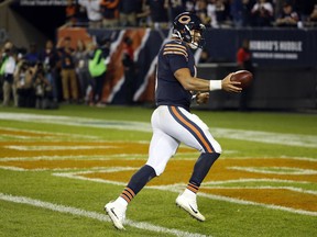 Chicago Bears quarterback Mitchell Trubisky (10) runs to the end zone for a two-point conversion play during the second half of an NFL football game against the Minnesota Vikings, Monday, Oct. 9, 2017, in Chicago. (AP Photo/Charles Rex Arbogast)