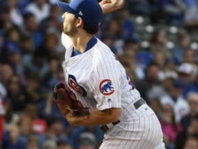 Chicago Cubs relief pitcher Dillon Maples (36) throws against the Cincinnati Reds during the ninth inning of a baseball game, Sunday, Oct. 1, 2017, in Chicago. (AP Photo/David Banks)
