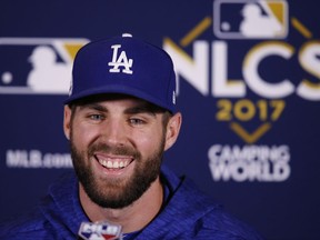 Los Angeles Dodgers' Chris Taylor talks during a news conference before Game 5 of baseball's National League Championship Series against the Chicago Cubs, Thursday, Oct. 19, 2017, in Chicago. (AP Photo/Charles Rex Arbogast)