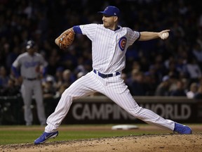 Chicago Cubs relief pitcher Mike Montgomery throws during the eighth inning of Game 5 of baseball's National League Championship Series against the Los Angeles Dodgers, Thursday, Oct. 19, 2017, in Chicago. (AP Photo/Matt Slocum)