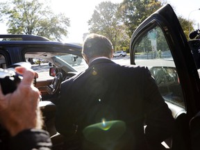 Paul Manafort gets into a car as he leaves Federal District Court in Washington, Monday, Oct. 30, 2017. Manafort, President Donald Trump's former campaign chairman, and Manafort's business associate Rick Gates have pleaded not guilty to felony charges of conspiracy against the United States and other counts. (AP Photo/Alex Brandon)