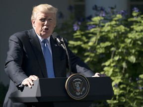 President Donald Trump speaks during anews conference with Greek Prime Minister Alexis Tsipras in the Rose Garden of the White House in Washington, Tuesday, Oct. 17, 2017. Trump on Tuesday will call the families of four soldiers killed this month in Niger, the White House says, as Trump again casts doubt on whether his predecessor appropriately consoled the families of military personnel who died in war. (AP Photo/Carolyn Kaster)