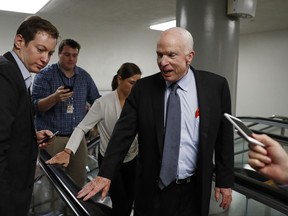 Sen. John McCain, R-Ariz., talks to reporters on Capitol Hill in Washington, Wednesday, Oct. 18, 2017. (AP Photo/Carolyn Kaster)