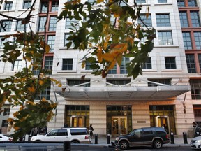 Fall leaves blow on a tree across from the federal courthouse Monday, Oct. 30, 2017, in Washington. President Donald Trump's former campaign chairman, Paul Manafort, and a former business associate, Rick Gates, have been told to surrender to federal authorities Monday, according to reports and a person familiar with the matter.  (AP Photo/Jacquelyn Martin)