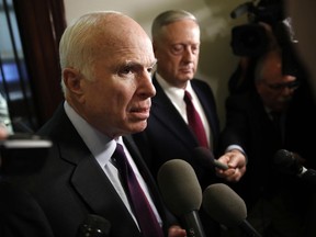 Sen. John McCain, R-Ariz., left, and Defense Secretary James Mattis, speak to members of the media after their meeting Friday, Oct. 20, 2017, on Capitol Hill in Washington. (AP Photo/Jacquelyn Martin)